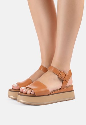 sandale dorée minelli