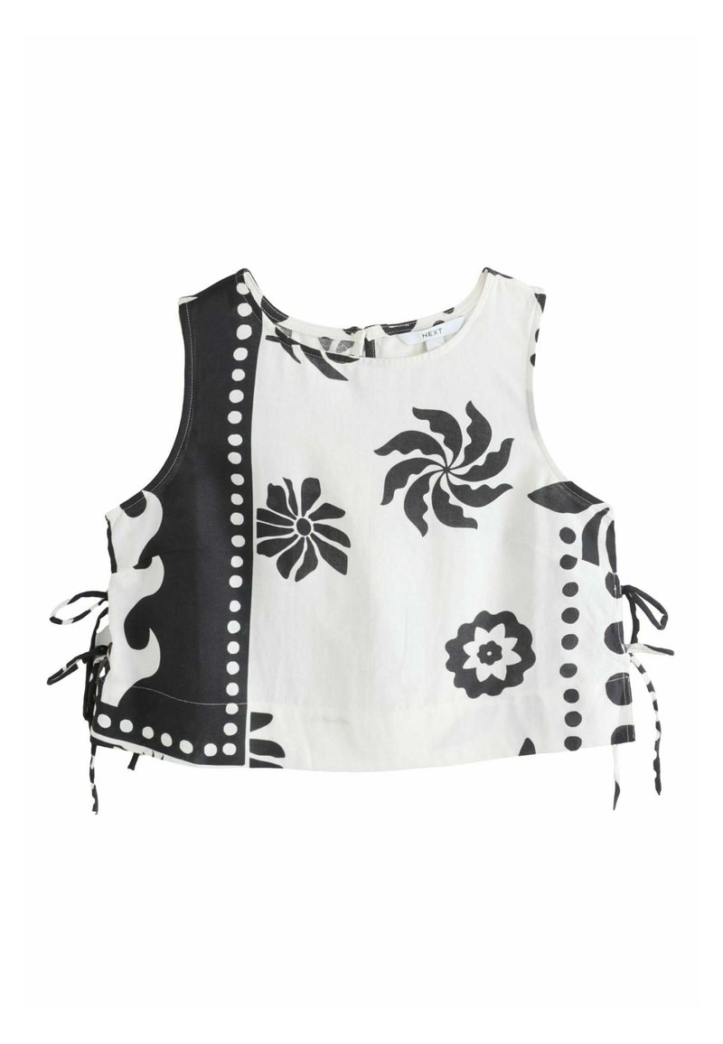 Crno-bijeli bezrukavni crop top s cvjetnim i spiralnim uzorcima, s bočnim vezovima i okruglim izrezom. Izrađen od laganog materijala.