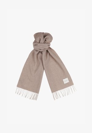 Beige scarf made of soft material, featuring a fringed hem and a small fabric label on one end, knotted for display.