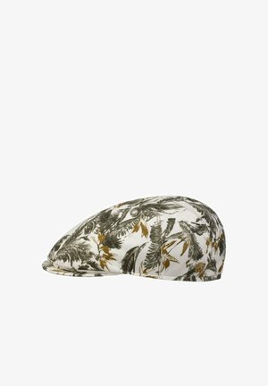 Flat cap with green and brown leaf print pattern on a white background, structured with a short brim.