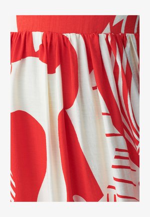 Rot-weiß gemusterter Stoff mit abstrakten Formen und einem strukturierten, gefalteten Design an der Taille. Weicher Fall, leichtes Material.