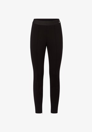 Schwarz taillierte Leggings mit hohem elastischem Bund und subtilen vertikalen Nähten auf der Vorderseite, ohne sichtbare Logos, außer am Taillenbund.