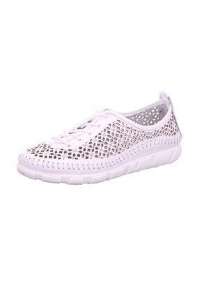 White casual shoe with geometric cut-out patterns, lace-up front, stitched sole, and a loop tab at the heel.