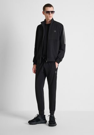 Antony Morato, REGULAR FLEECE IN SOFT FABRIC WITH PATCH ON HEART AND TAPE ON SLEEVES - Sudadera con cremallera - black