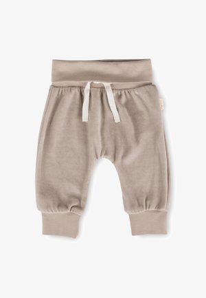 Pantaloni da ginnastica beige per bambini realizzati in tessuto morbido, con vita e polsini a coste, dotati di coulisse per la regolazione.
