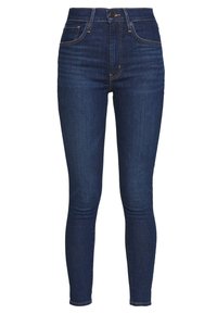 Högmidjade skinny jeans i mörkblå denim med subtil stretch, med fem fickor, bälteshällor och klassisk guldtråd.