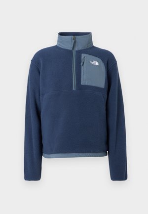 Marineblauer Fleecepullover mit halbem Reißverschluss, hohem Kragen und hellblauer, mit Reißverschluss versehener Brusttasche mit Logo.