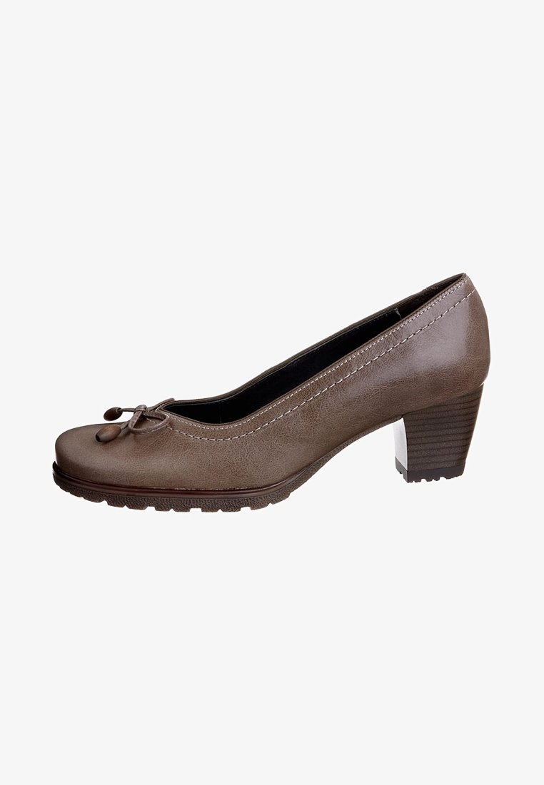 Brown leather pump with a rounded toe, bow detail at the front, and a textured outsole. Low block heel, contrasting stitching accents.