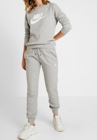 Nike Sportswear Träningsbyxor - mottled grey