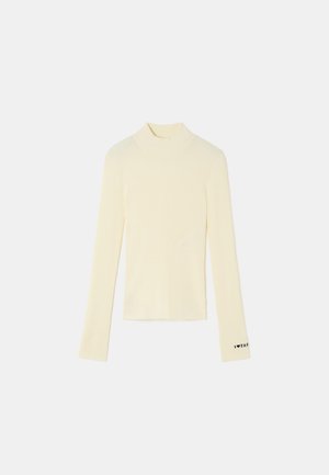 - Sweter
