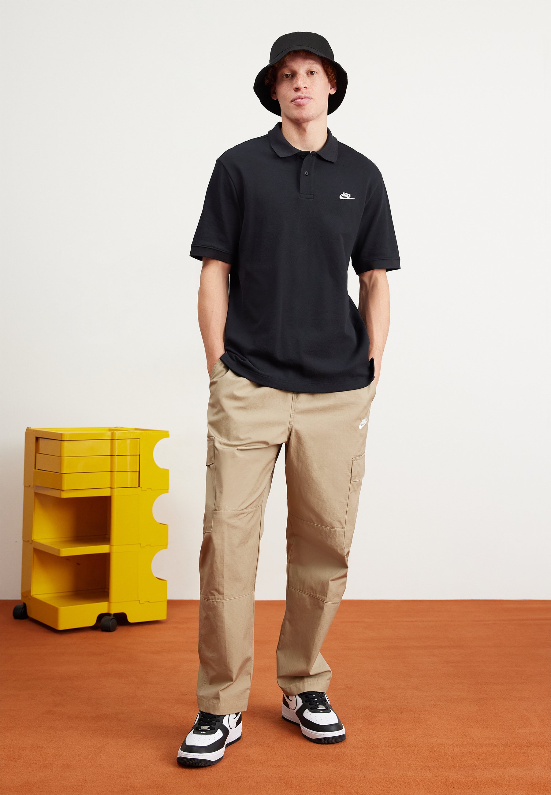 nike black and white polo shirt