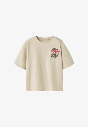T-shirt beige à manches courtes avec petit logo Rolling Stones et motif de lèvres imprimé léopard sur la poitrine gauche.