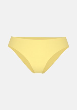 Gelbe nahtlose Damen-Bikinihose mit glatter Oberfläche vor schlichtem hellgrauem Hintergrund.