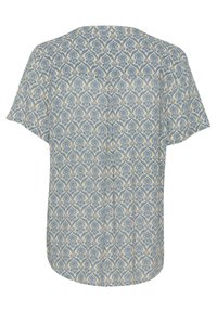 Blouse à manches courtes en tissu léger avec un motif floral bleu et crème, doté d'un ourlet arrondi et de détails de boutons dans le dos.