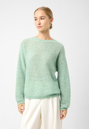 - Sweter