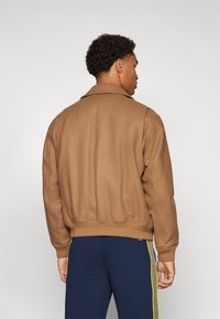 Lacoste Bomber tipa jaka - cookie