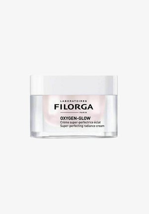 Filorga OXYGEN-GLOW creme i et gennemsigtigt glas med et hvidt låg. Teksten indeholder sort branding og produktdetaljer på forsiden.