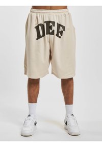 DEF PRINT  - Jogginghose - beige