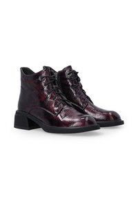 Burgundy leather ankle boots with a glossy finish, lace-up design, textured pattern, and a sturdy block heel.
