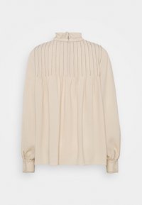 Blusa beige a maniche lunghe con colletto alto, dettagli plissettati sul retro e polsini abbottonati. Tessuto morbido e liscio.