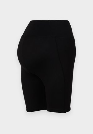 Črne kolesarske kratke hlače visokega pasu z gladko teksturo, imajo oprijet kroj in šivne šive ter segajo tik nad koleno.