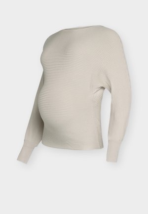 Maglione premaman in maglia a coste color crema con vestibilità morbida, scollo ampio e maniche lunghe, che mette in risalto una texture morbida e un design casual.
