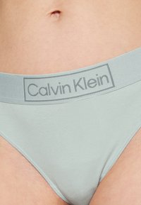Calvin Klein Underwear THONG REIMAGINED HERITAGE - Stringit - aqua pool
