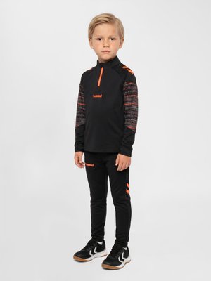 Hummel, BLAZE PRO - Tracksuit bottoms - black/orange
