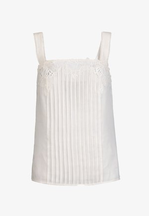 Fehér, ujjatlan blúz függőleges redőkkel és virágmintás csipkehímzéssel a négyzet alakú nyakkivágás és a pántok mentén.