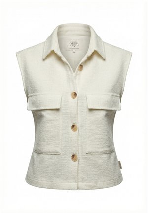 Gilet chemise sans manches crème texturé avec col, quatre boutons beige et deux poches poitrine à rabat.