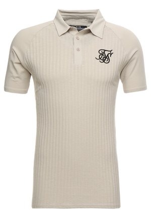 Beige polo shirt featuring ribbed texture, short raglan sleeves, a three-button placket, and an embroidered black logo on the chest.