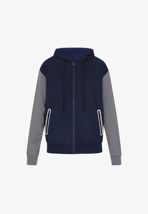 Námořnická modrá mikina s šedými rukávy, zipový přední díl, nastavitelné stahovací kapuce a dvě postranní kapsy na zip. Hladká textura, neformální design.