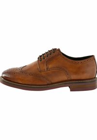 Pantofii de piele maro, cu detalii brogue, șase găuri pentru șireturi și o talpă în contrast. Textură netedă cu vârful rotunjit.
