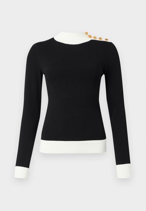 Black long-sleeve sweater with white ribbed cuffs and hem, featuring a white collar and five gold buttons on the shoulder.