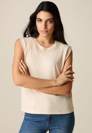 CON PERLE - Camiseta estampada - beige