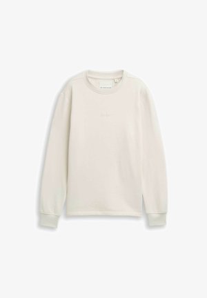 Sweatshirt de un bej deschis, cu decolteu rotund, mâneci lungi și manșete cu rinforțare. Materialul pare moale, cu o textură subtilă.