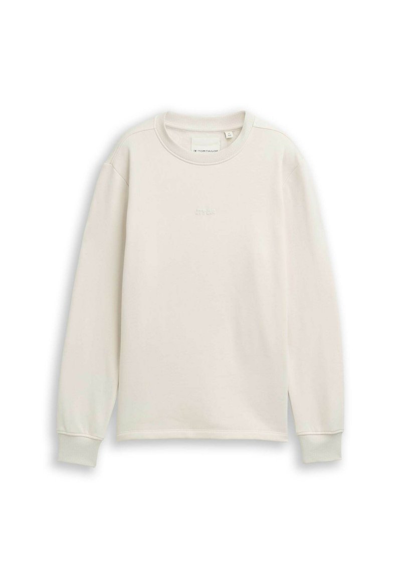 Lichtbeige sweatshirt met een ronde halslijn, lange mouwen en geribde manchetten. Het materiaal lijkt zacht met een subtiele tekstuur.