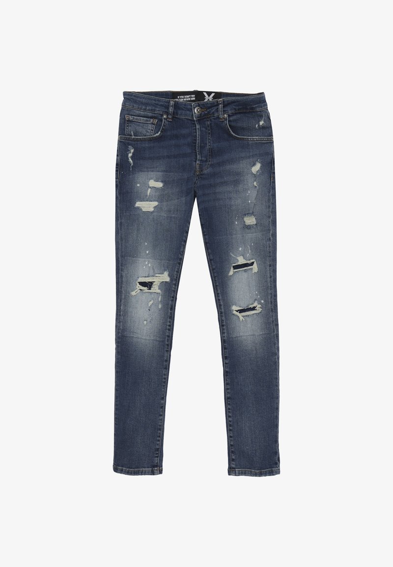 Jeans skinny blu scuro sbiaditi con strappi consumati, design a cinque tasche e chiusura con bottone. L'orlo è leggermente sfilacciato.