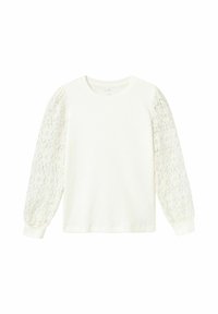 Top de manga larga blanca con cuerpo acanalado y mangas abullonadas de encaje transparente con patrones florales. Tela suave con puños ajustados.