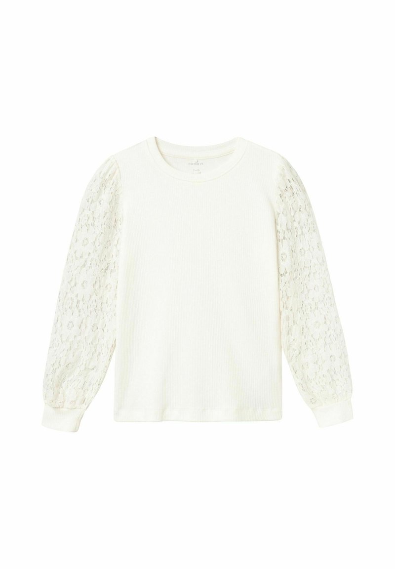 Top de manga larga blanca con cuerpo acanalado y mangas abullonadas de encaje transparente con patrones florales. Tela suave con pu�ños ajustados.