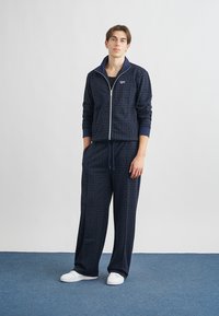 Reebok Classic HERITAGE MONOGRAM TRACK JACKET - Lukuga pusa - vector navy