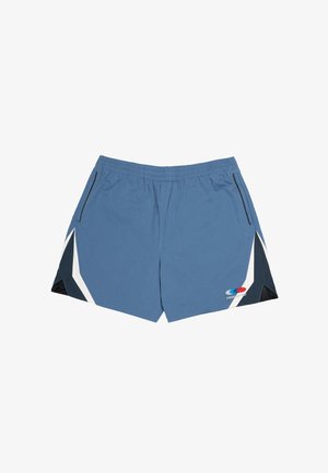 Pantalones cortos deportivos azules con cintura elástica, bolsillos laterales, acentos geométricos en blanco y negro, y un pequeño logo rojo y azul en la pierna derecha.