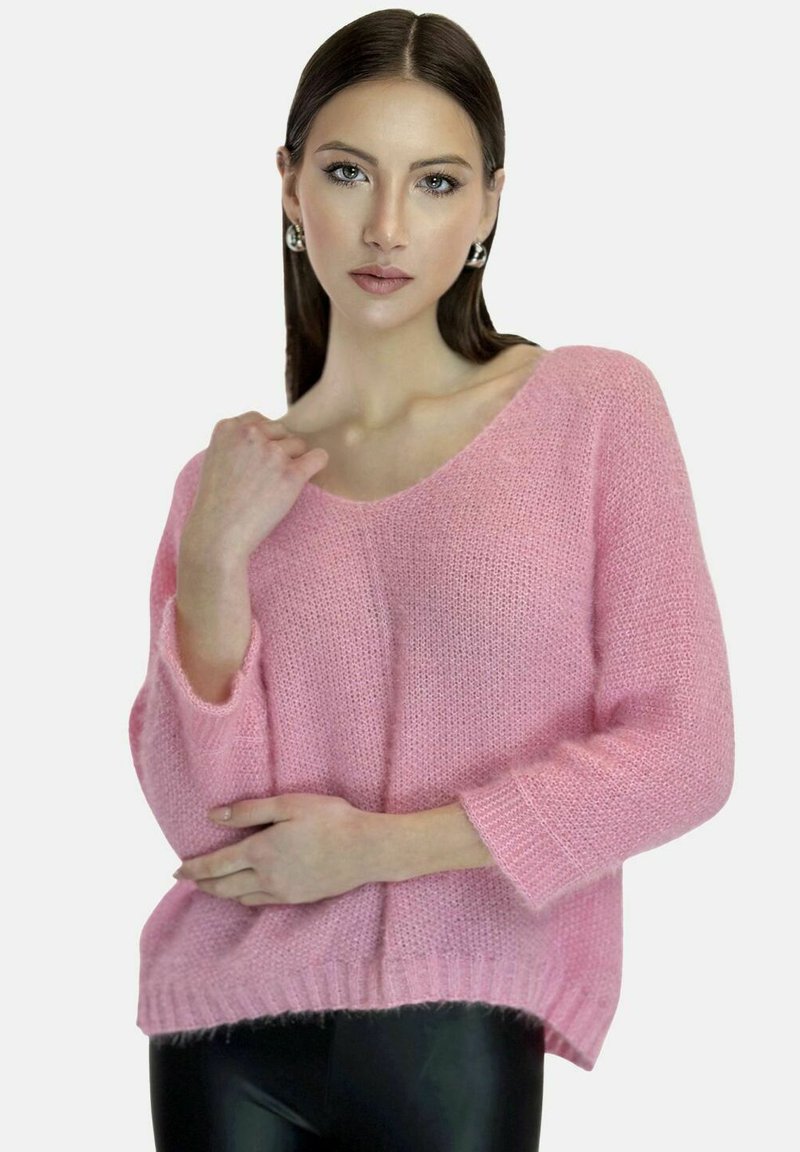 Maglione lavorato a maglia in rosa pastello, morbido e leggero, con scollo a V, maniche lunghe e orlo a coste.