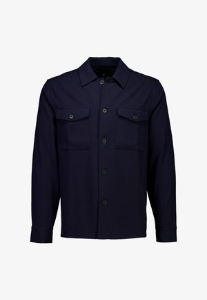 Marineblå, langærmet skjorte med knapper fremme lavet af glat stof; har to brystlommer og en krave med knaplukning.