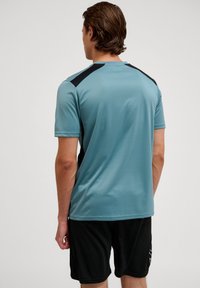 Hummel MULTI PL - T-shirt till träning - arctic