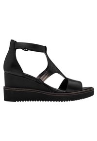 Sandali platform in pelle nera con punta aperta, design a cinturino incrociato, dettagli perforati e suola testurizzata.