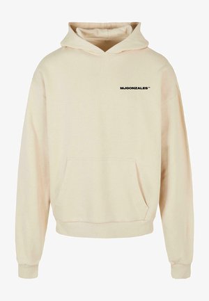 Hoodie color crema realizzato in tessuto morbido, con tasca frontale e cappuccio regolabile con cordino. Logo nero "MJGONZALES" sul petto.