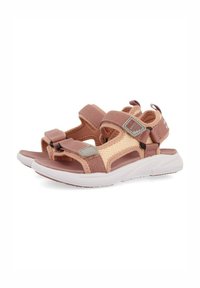 Sandalias rosas hechas de tela y goma, con correas ajustables, suela texturizada y un diseño de malla para transpirabilidad.