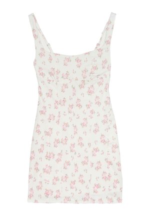 Mini-robe blanche sans manches avec motif floral rose et encolure carrée.