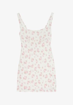 Mini-robe blanche sans manches avec motif floral rose et encolure carrée.